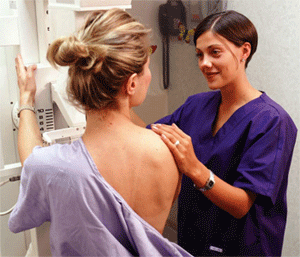 Female patient getting annual mammogram